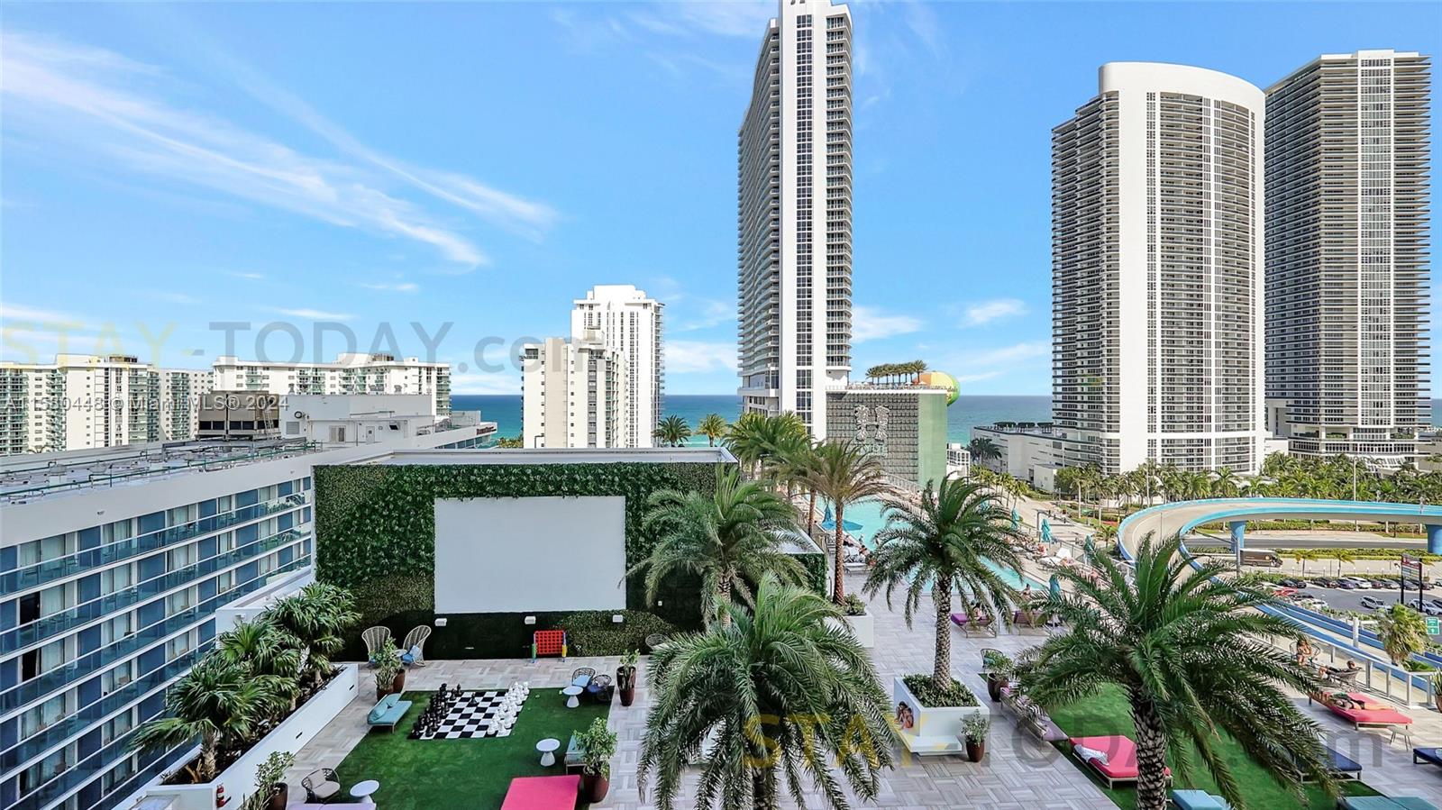 4010 South Ocean Drive, Unit R805 Hollywood, FL 33019 - Photo 34 of 36 a city view with tall buildings