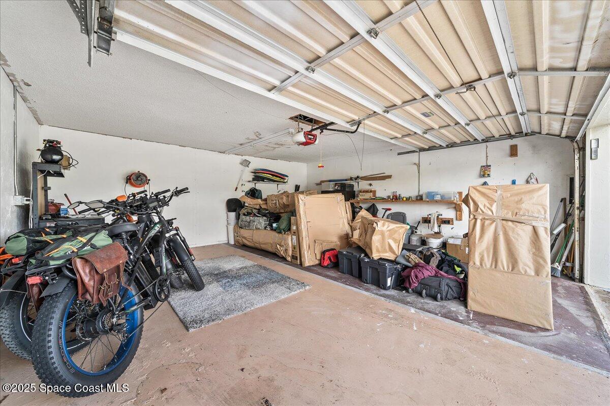 1700 South Atlantic Avenue, Unit 104 Cocoa Beach, FL 32931 - Photo 28 of 55 a view of a room with gym equipment