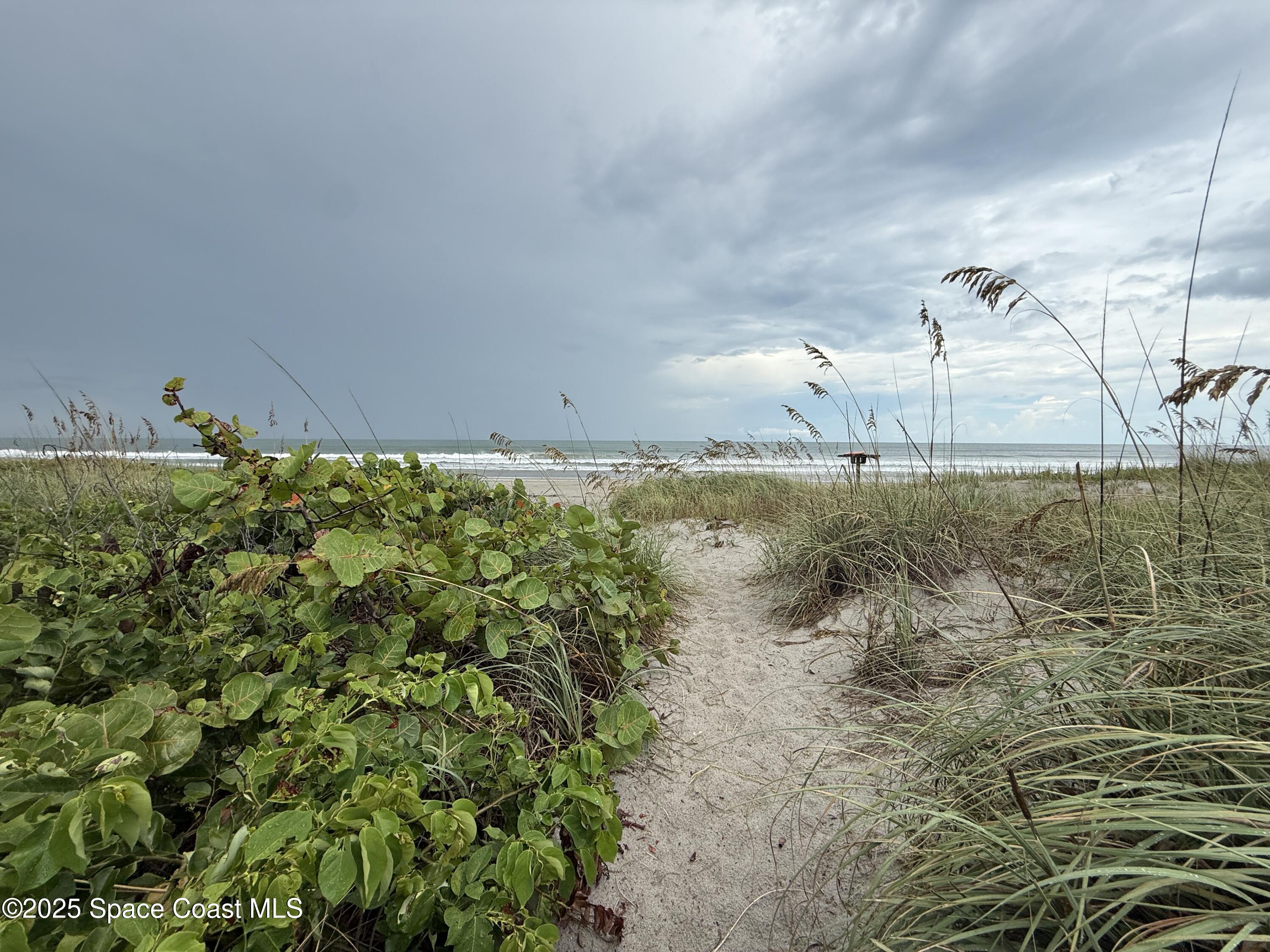 1700 South Atlantic Avenue, Unit 104 Cocoa Beach, FL 32931 - Photo 52 of 55 a view of a lake view