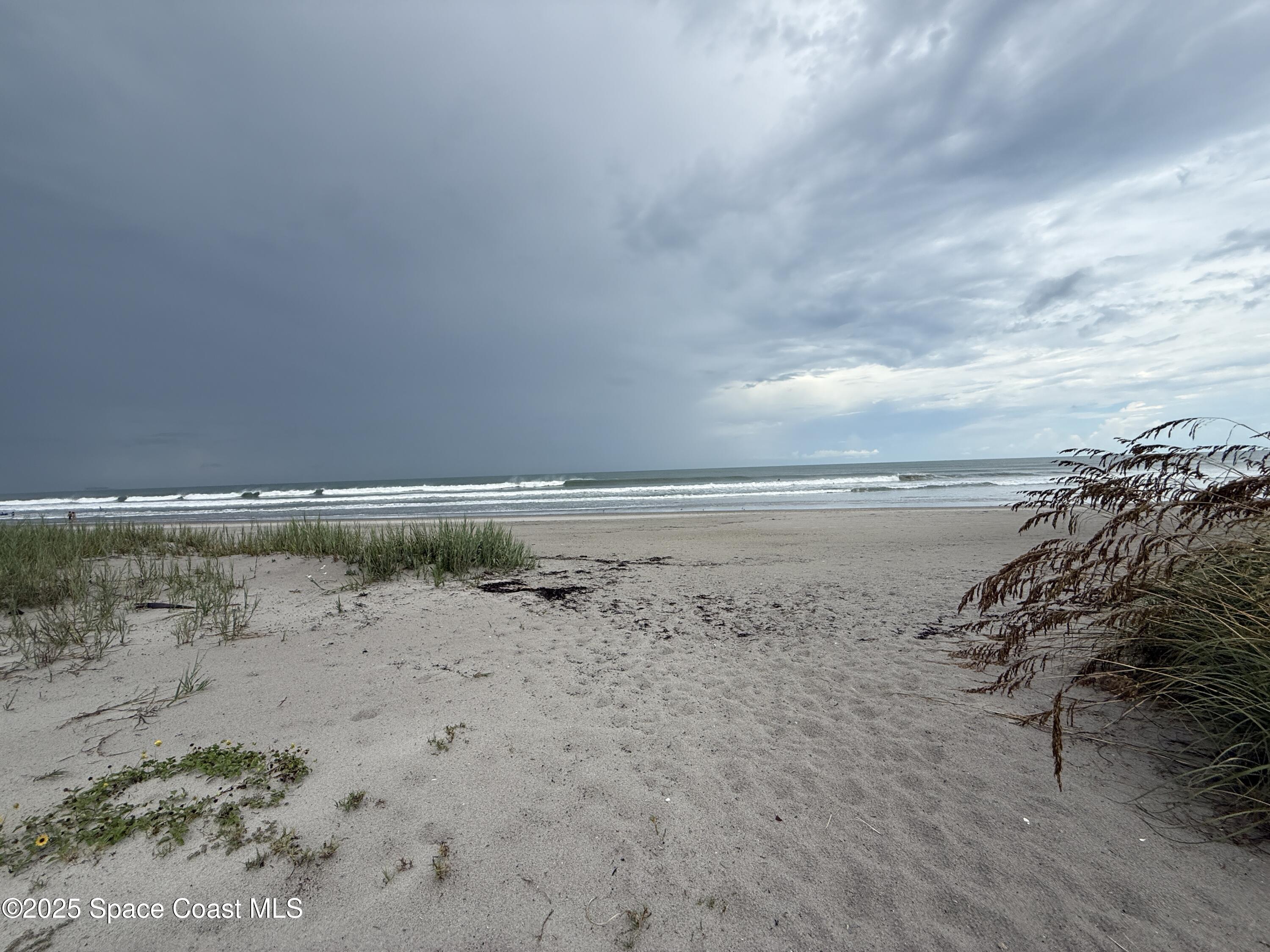 1700 South Atlantic Avenue, Unit 104 Cocoa Beach, FL 32931 - Photo 54 of 55 a view of beach and ocean