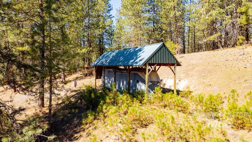 5 Sunset Trail Banks, ID 83602 - Photo 6 of 25 View of outdoor structure with view of wooded area