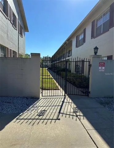 a view of balcony with a floor to ceiling window