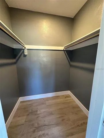 a view of a room with racks on the wall