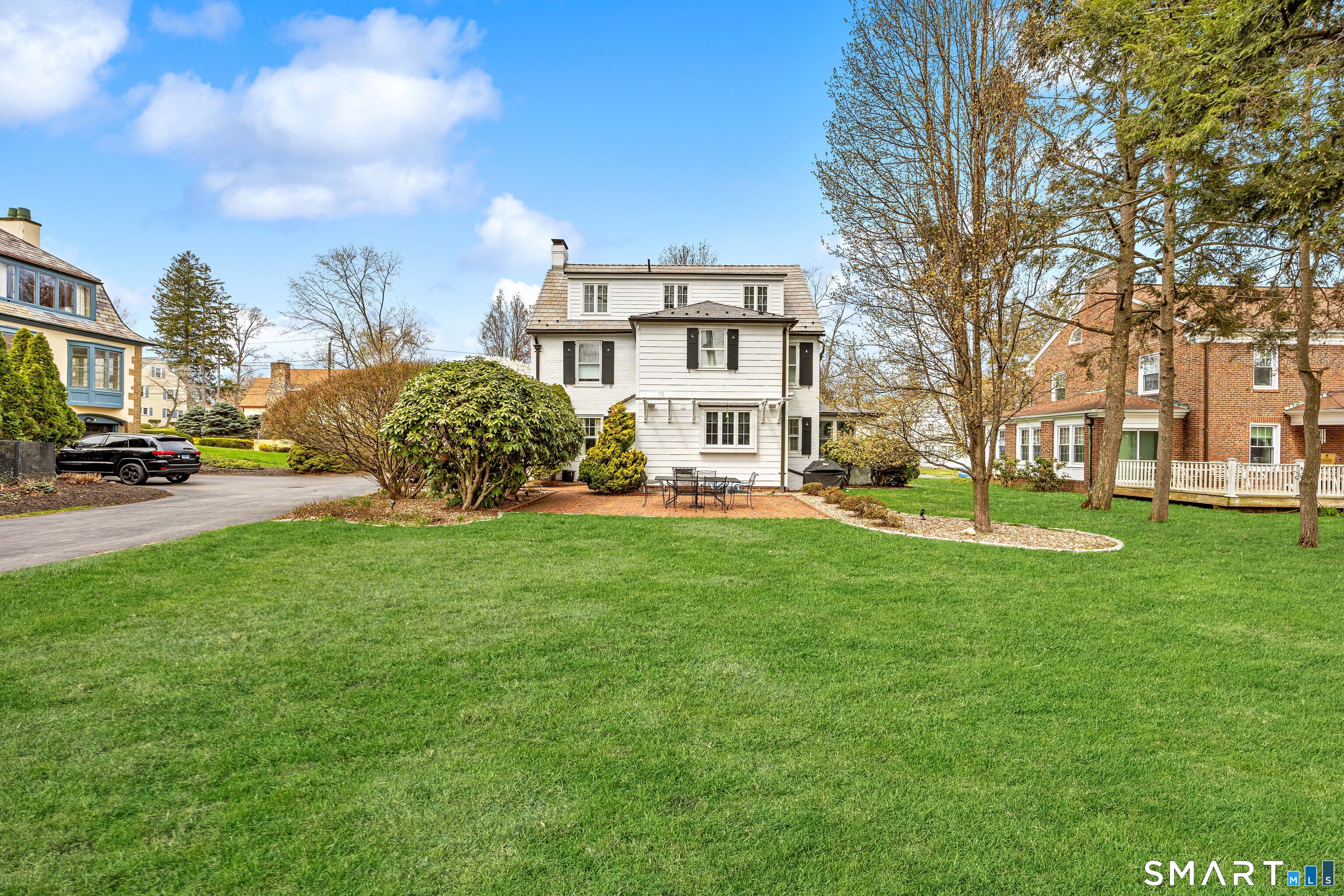 40 10 Acre Road New Britain, CT 06052 - Photo 36 of 38 a view of a house with a big yard and large trees