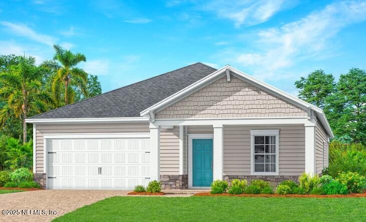 76069 Estuary Way Yulee, FL 32097 - Photo 1 of 42 a view of a house with a yard