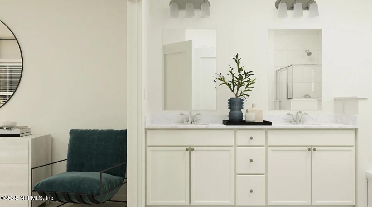 76069 Estuary Way Yulee, FL 32097 - Photo 29 of 42 a bathroom with a sink and a mirror