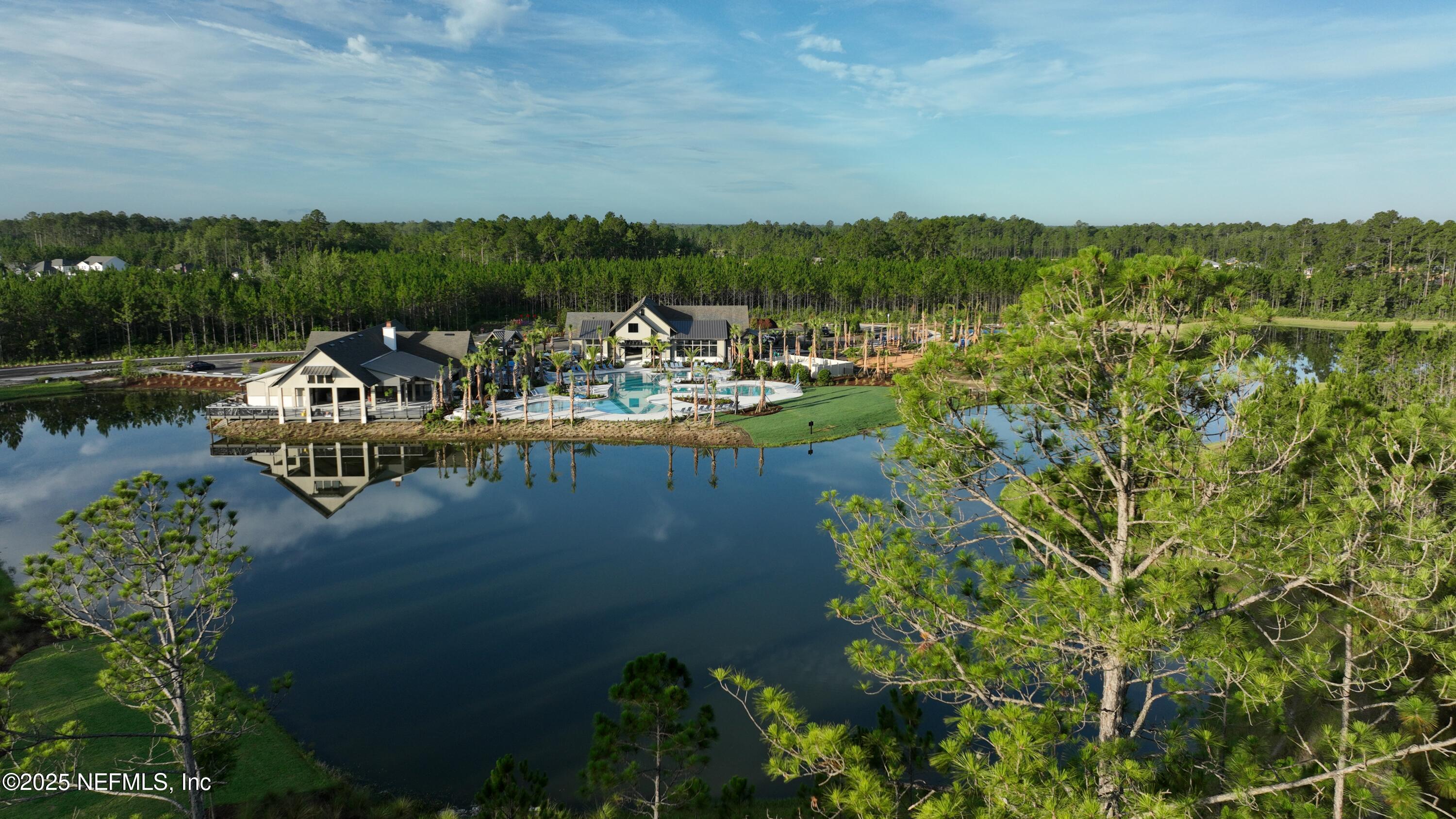 76069 Estuary Way Yulee, FL 32097 - Photo 7 of 42 a view of a lake with a mountain