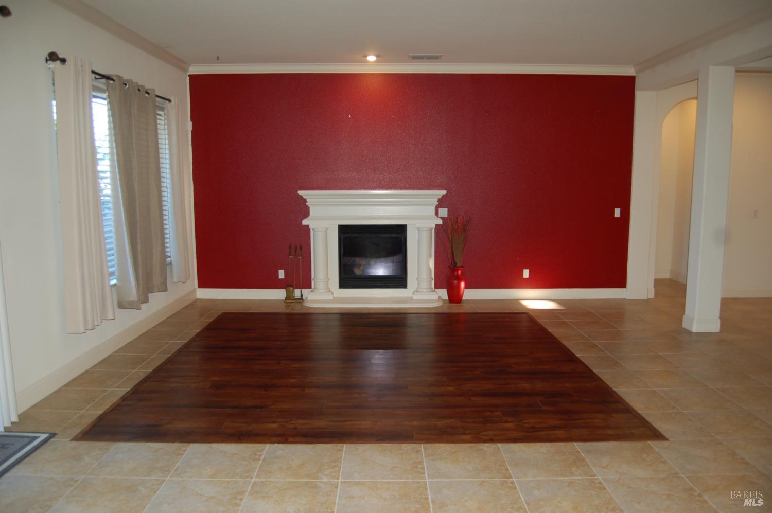 1064 Diamante Rio Vista, CA 94571 - Photo 2 of 14 a view of empty room with fireplace and wooden floor