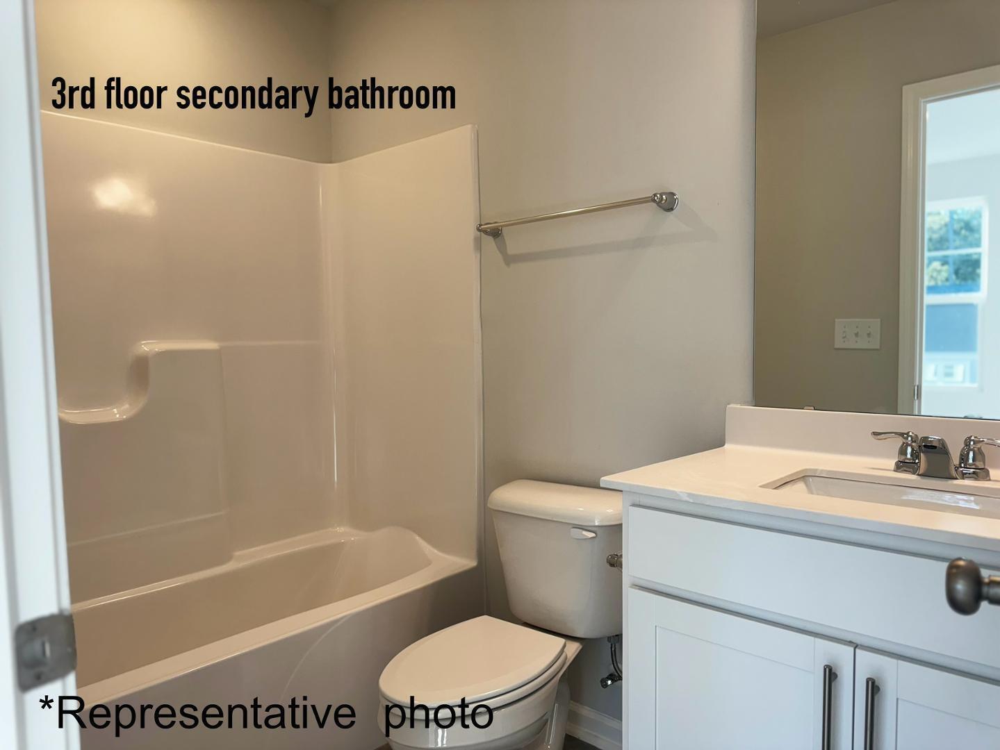 168 Aster Bloom Lane Raleigh, NC 27610 - Photo 26 of 38 a bathroom with a sink a toilet and shower