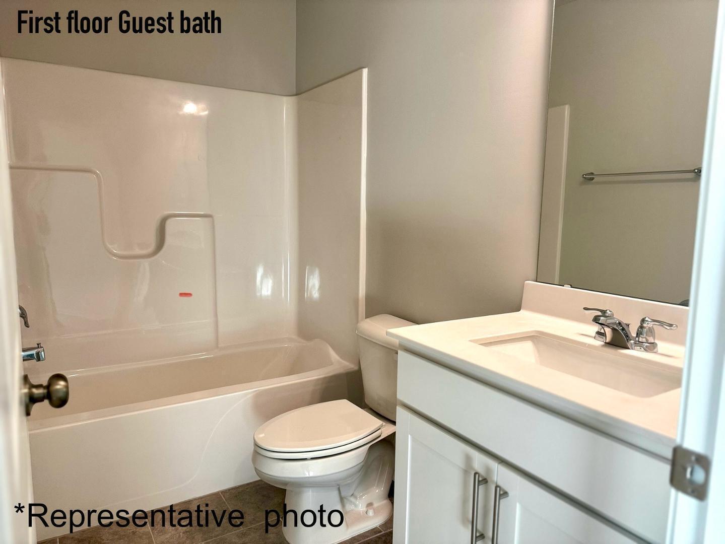 168 Aster Bloom Lane Raleigh, NC 27610 - Photo 8 of 38 a bathroom with a sink a toilet and a bathtub