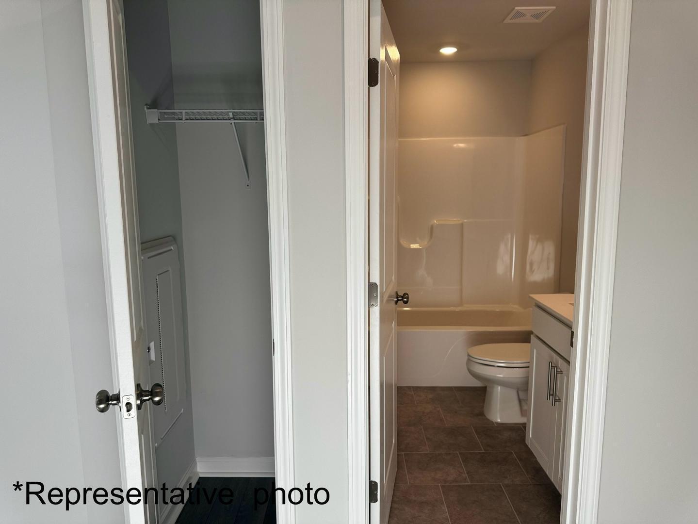 168 Aster Bloom Lane Raleigh, NC 27610 - Photo 9 of 38 a bathroom with a granite countertop toilet and a shower