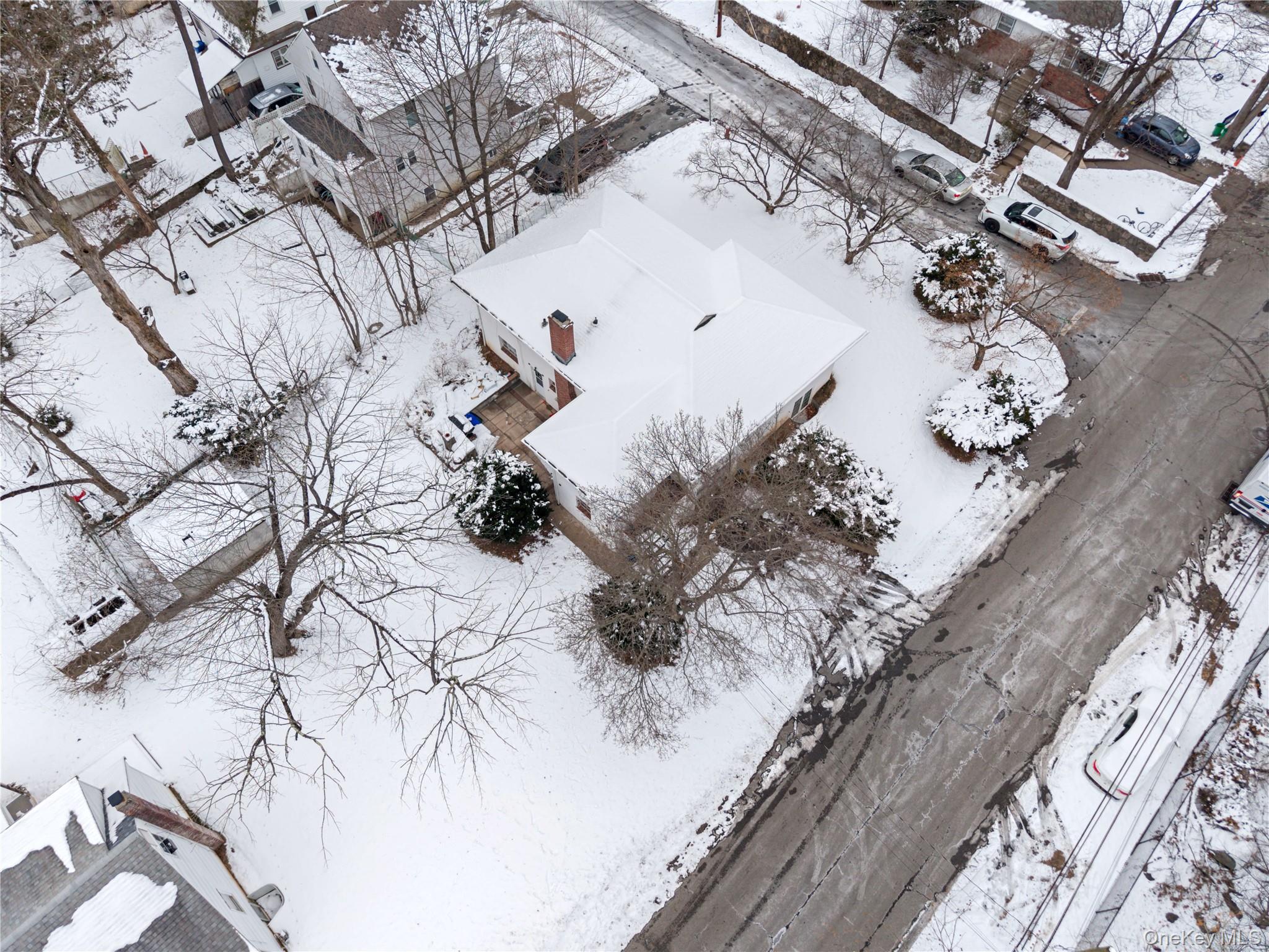 15 Bridge Street Suffern, NY 10901 - Photo 22 of 22 a view of white house with a snow on the wall