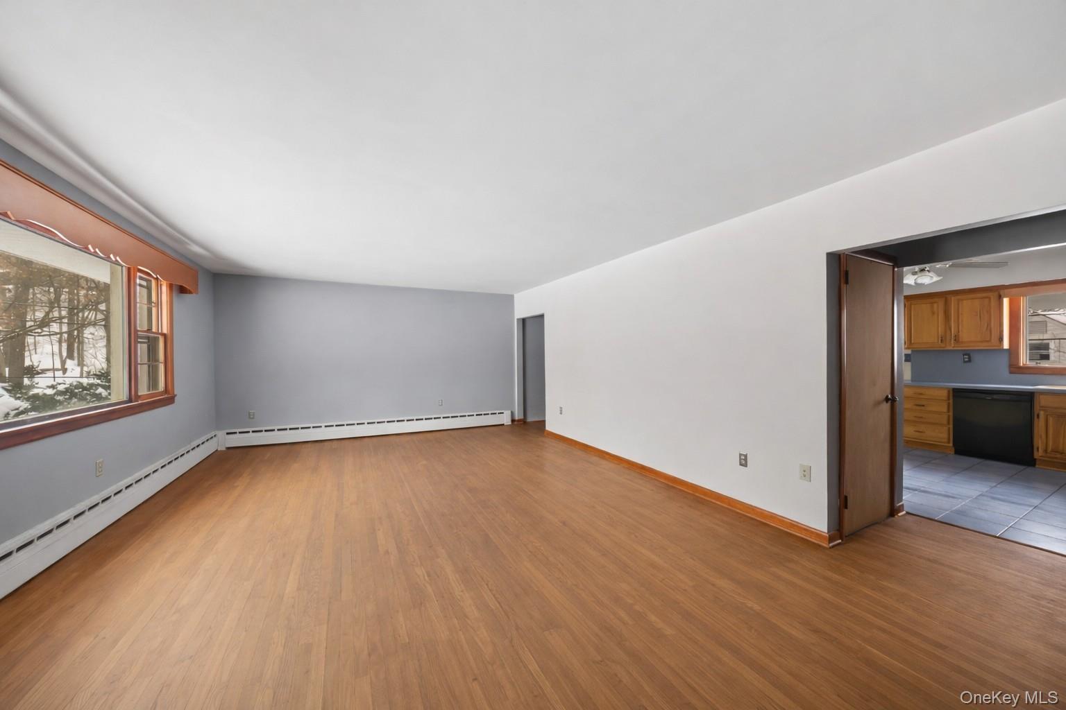 15 Bridge Street Suffern, NY 10901 - Photo 4 of 22 a view of a room with wooden floor and window