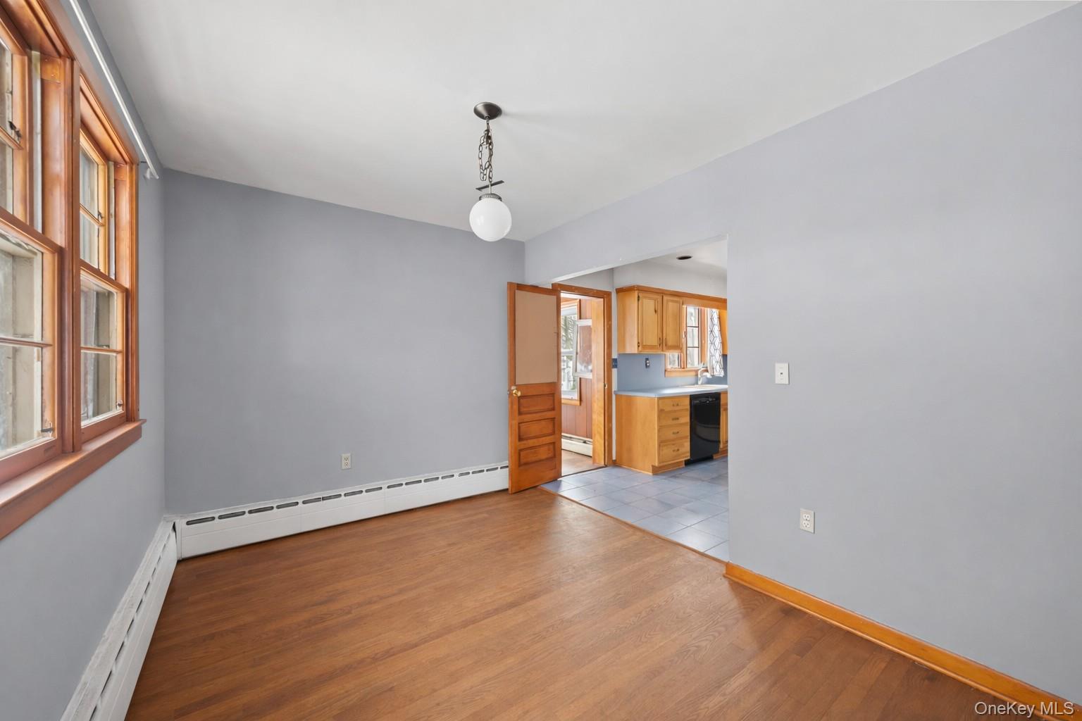 15 Bridge Street Suffern, NY 10901 - Photo 9 of 22 a view of a livingroom with wooden floor and entryway