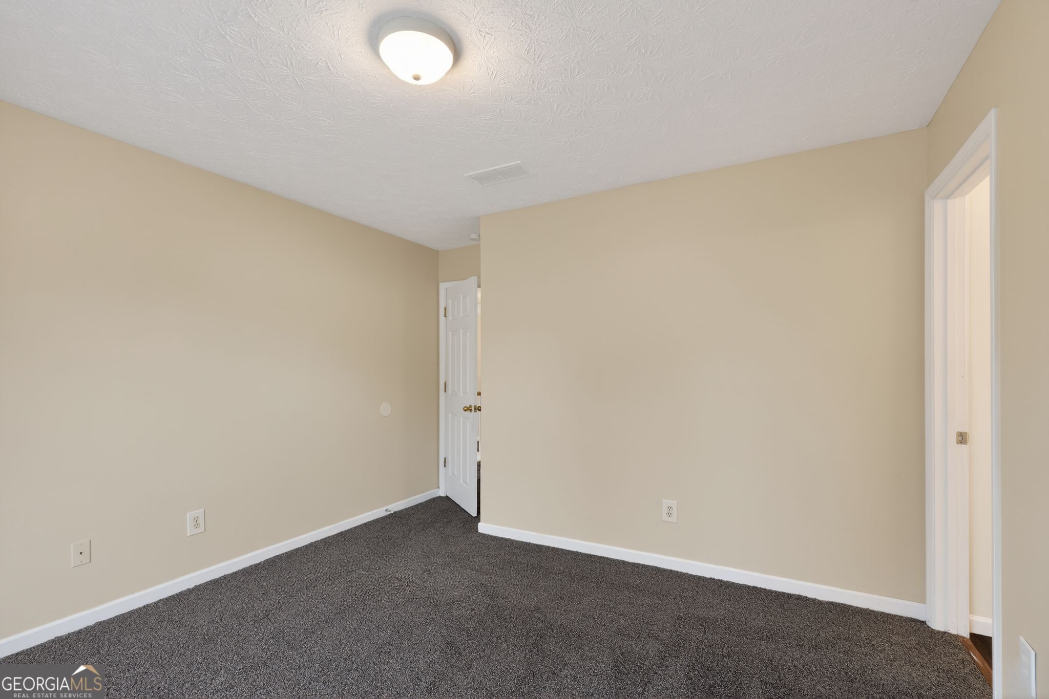3960 East Saddle Ridge Drive Lithonia, GA 30038 - Photo 27 of 36 a view of an empty room