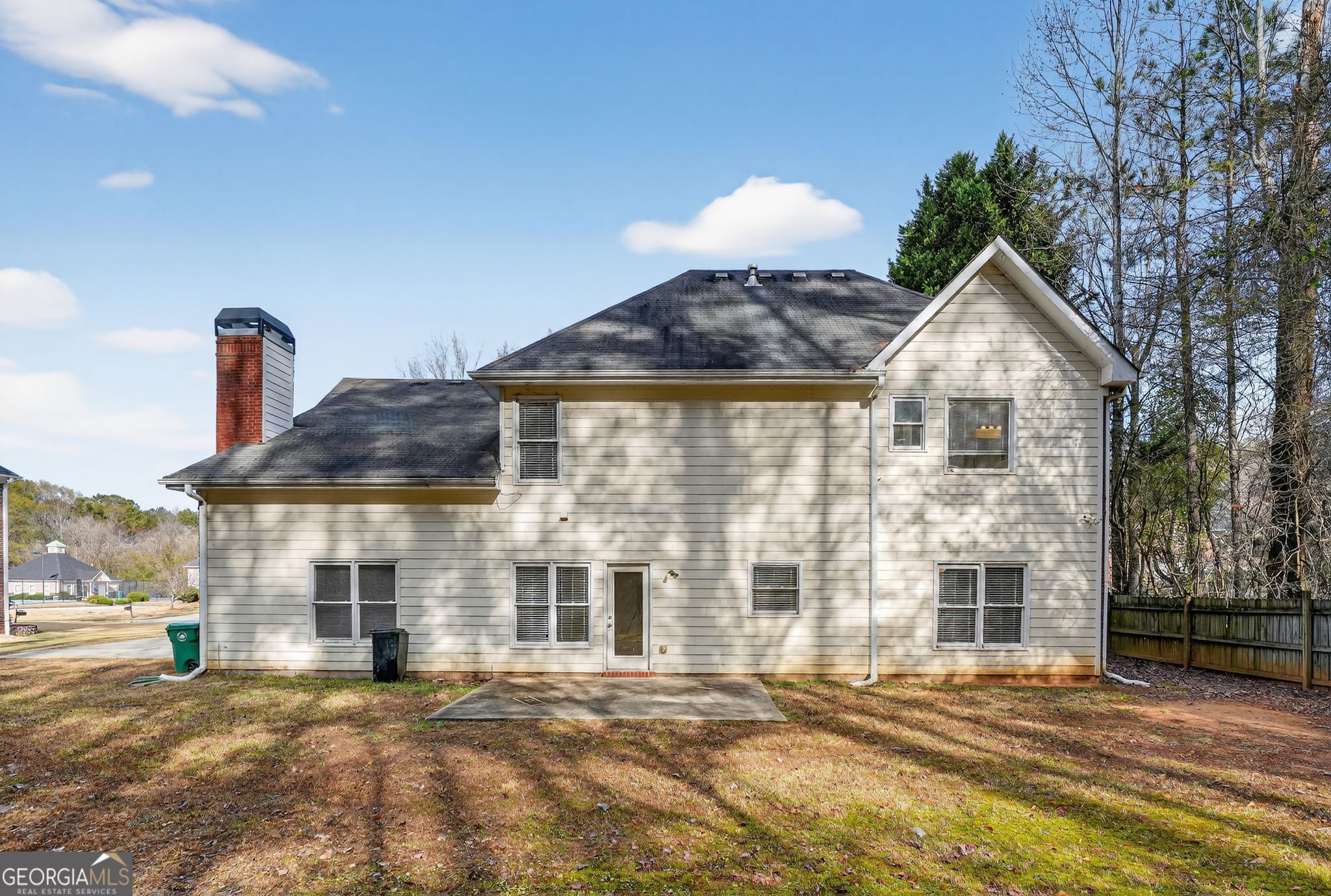 3960 East Saddle Ridge Drive Lithonia, GA 30038 - Photo 32 of 36 a front view of a house with a yard