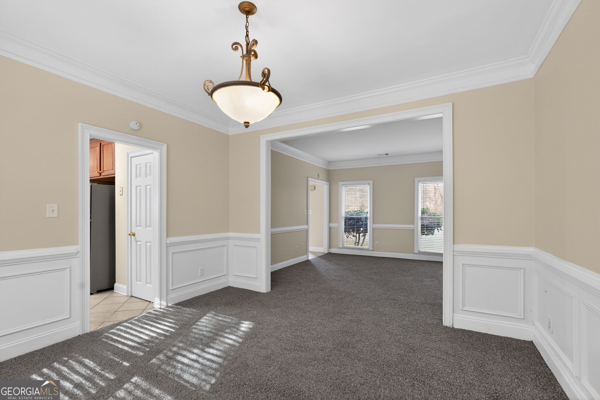 3960 East Saddle Ridge Drive Lithonia, GA 30038 - Photo 6 of 36 a view of a room with cabinet and mirrors