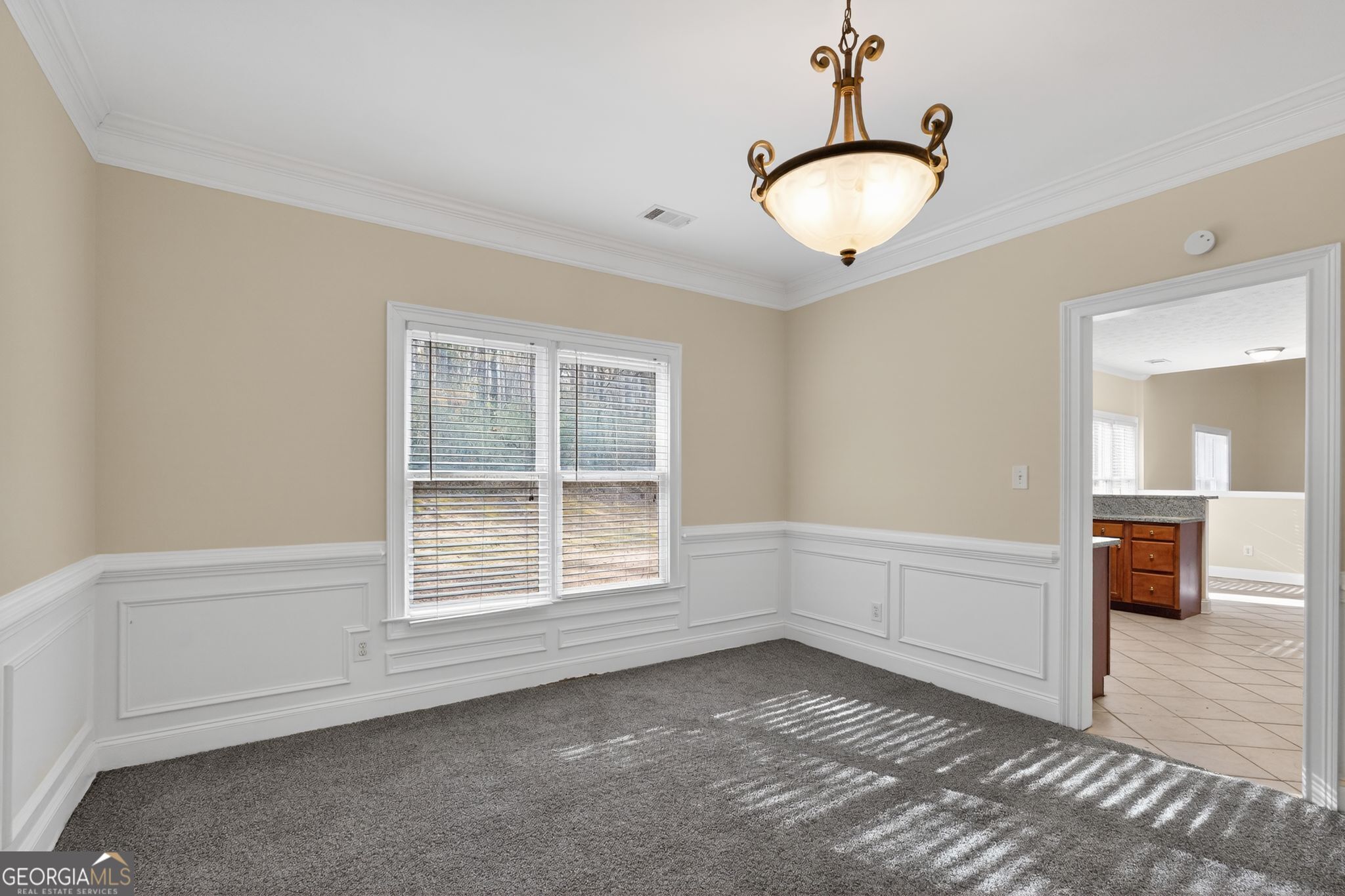 3960 East Saddle Ridge Drive Lithonia, GA 30038 - Photo 8 of 36 a view of an empty room with a window
