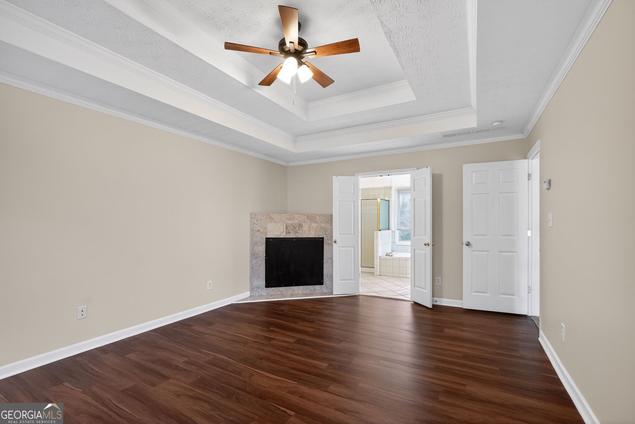 3960 East Saddle Ridge Drive Lithonia, GA 30038 - Photo 10 of 36 wooden floor in an empty room with a window