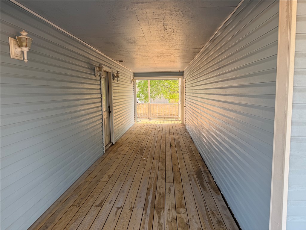 4493 Highway 359 Benavides, TX 78341 - Photo 11 of 20 a view of a room with wooden floor
