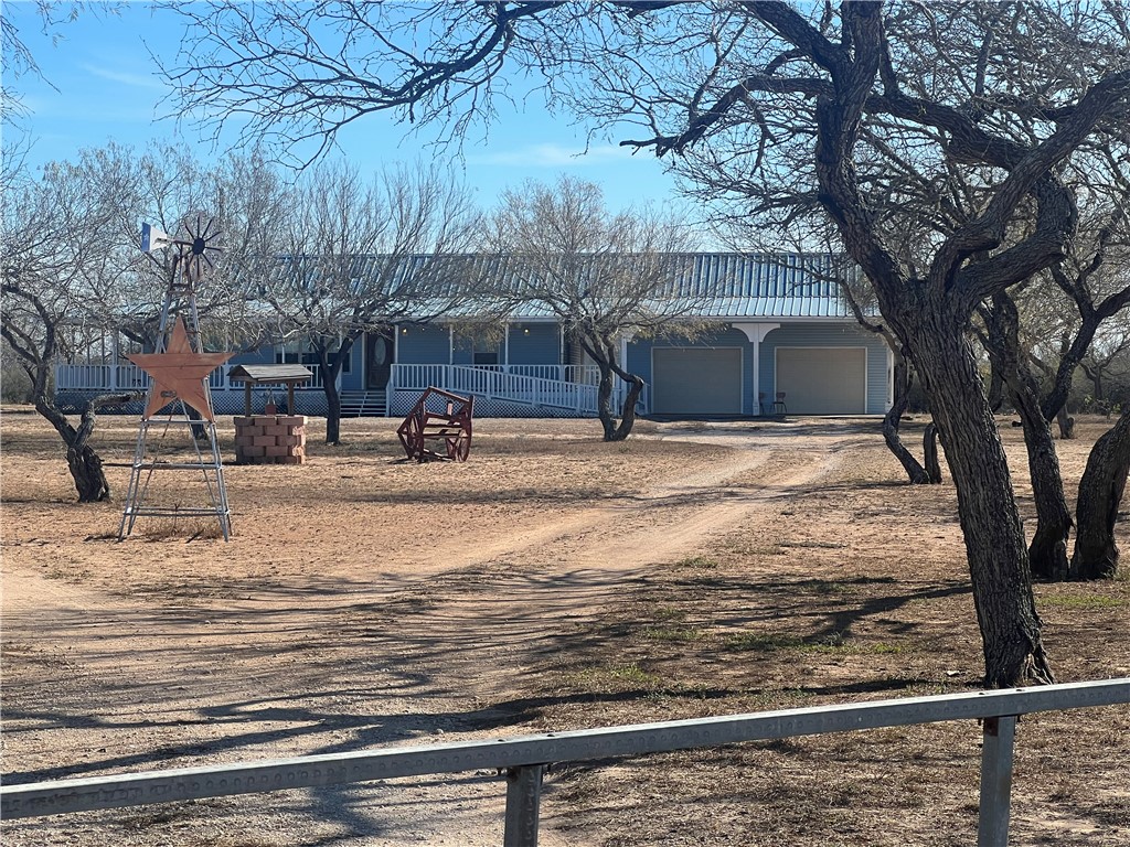 4493 Highway 359 Benavides, TX 78341 - Photo 2 of 20 a view of road with large trees