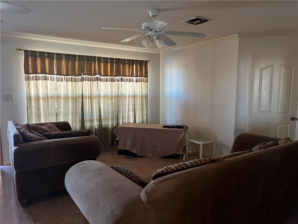 4493 Highway 359 Benavides, TX 78341 - Photo 5 of 20 a living room with furniture and a window