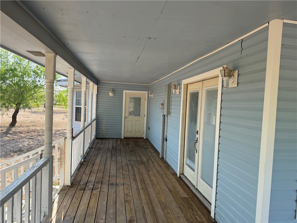 4493 Highway 359 Benavides, TX 78341 - Photo 10 of 20 a view of a house with wooden floor