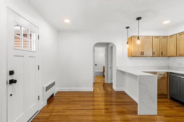 a bathroom with a toilet a sink and bathtub