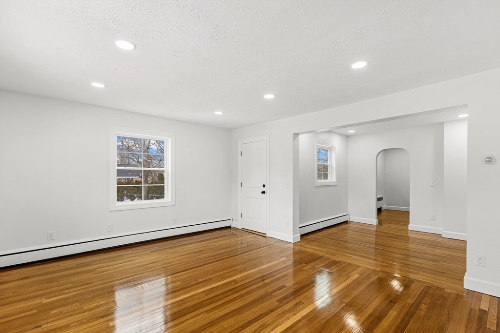 225 Rich Street Fall River, MA 02720 - Photo 19 of 30 a view of an empty room with wooden floor and a window