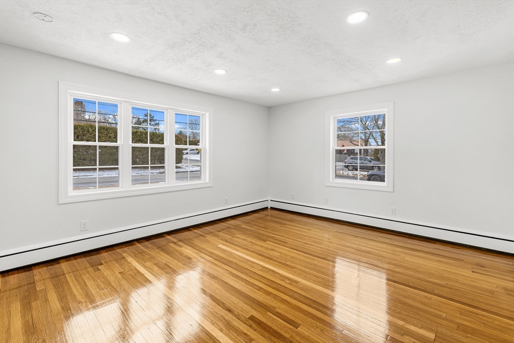 225 Rich Street Fall River, MA 02720 - Photo 21 of 30 a view of empty room with wooden floor and fan