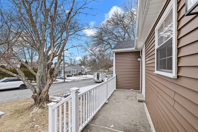 a view of a wooden house with a trees