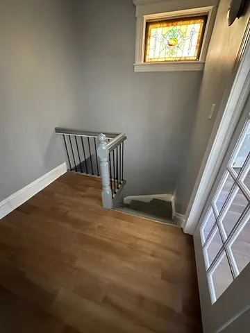 a view of empty room with windows