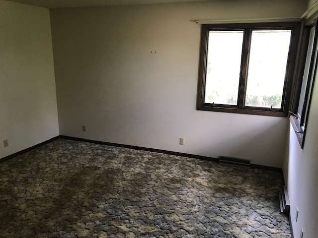 2983 East Water Road Byron, IL 61010 - Photo 7 of 17 a view of a window in an empty room