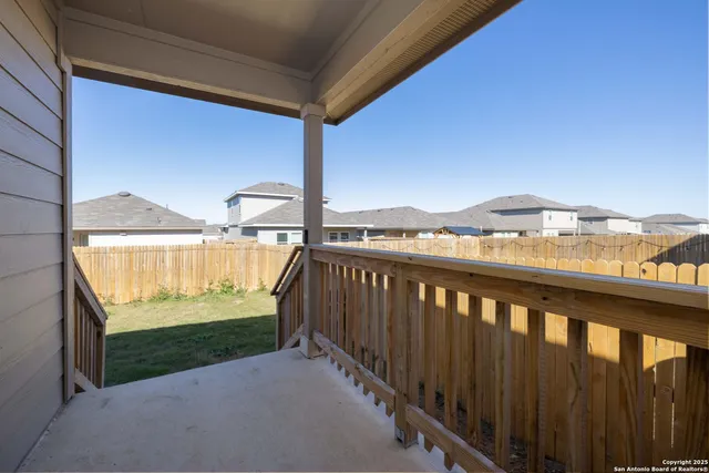 a view of a porch with a yard