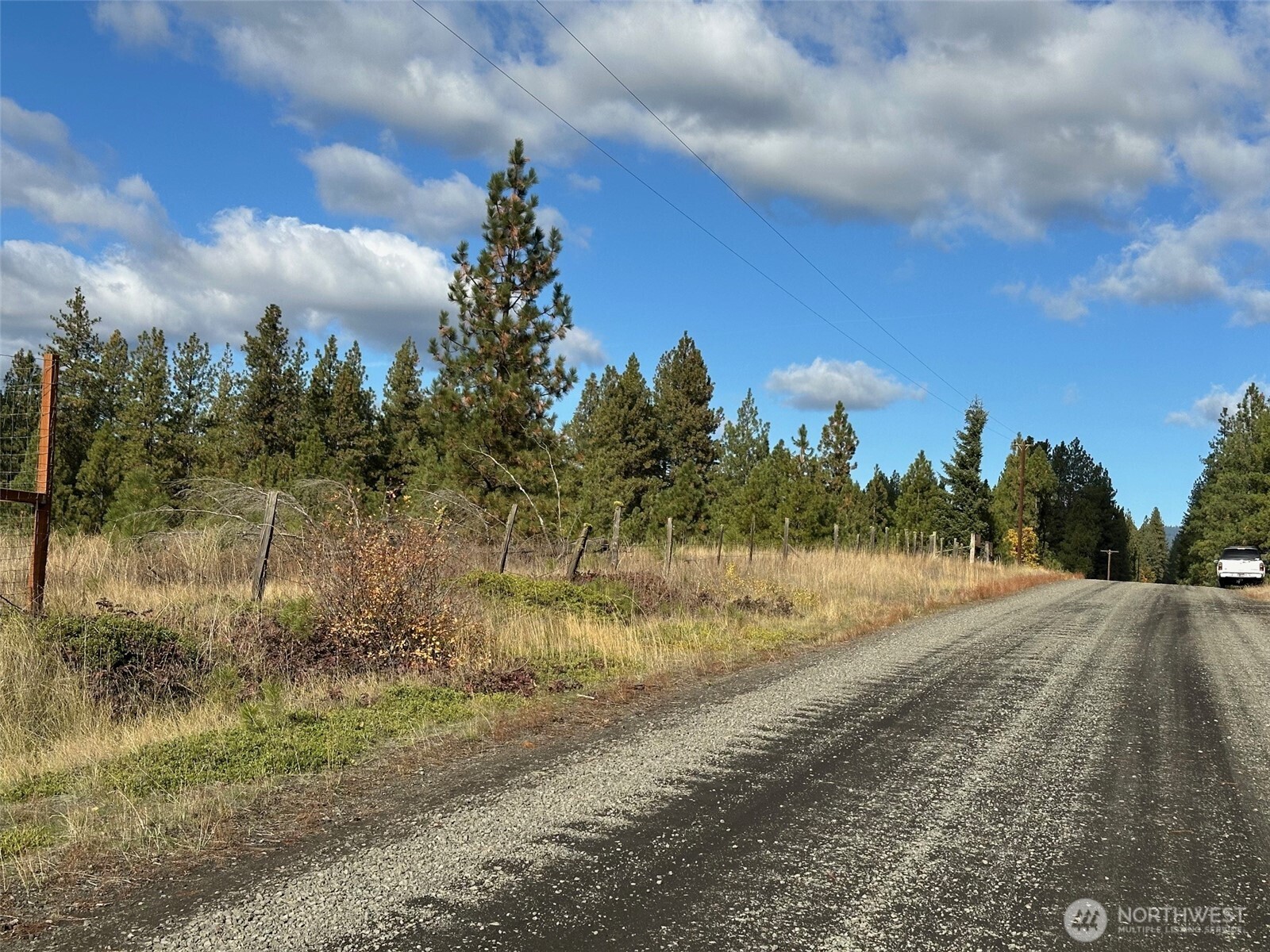 1 Garrison Road Goldendale, WA 98620 - Photo 5 of 8 a view of a lake view with houses in back