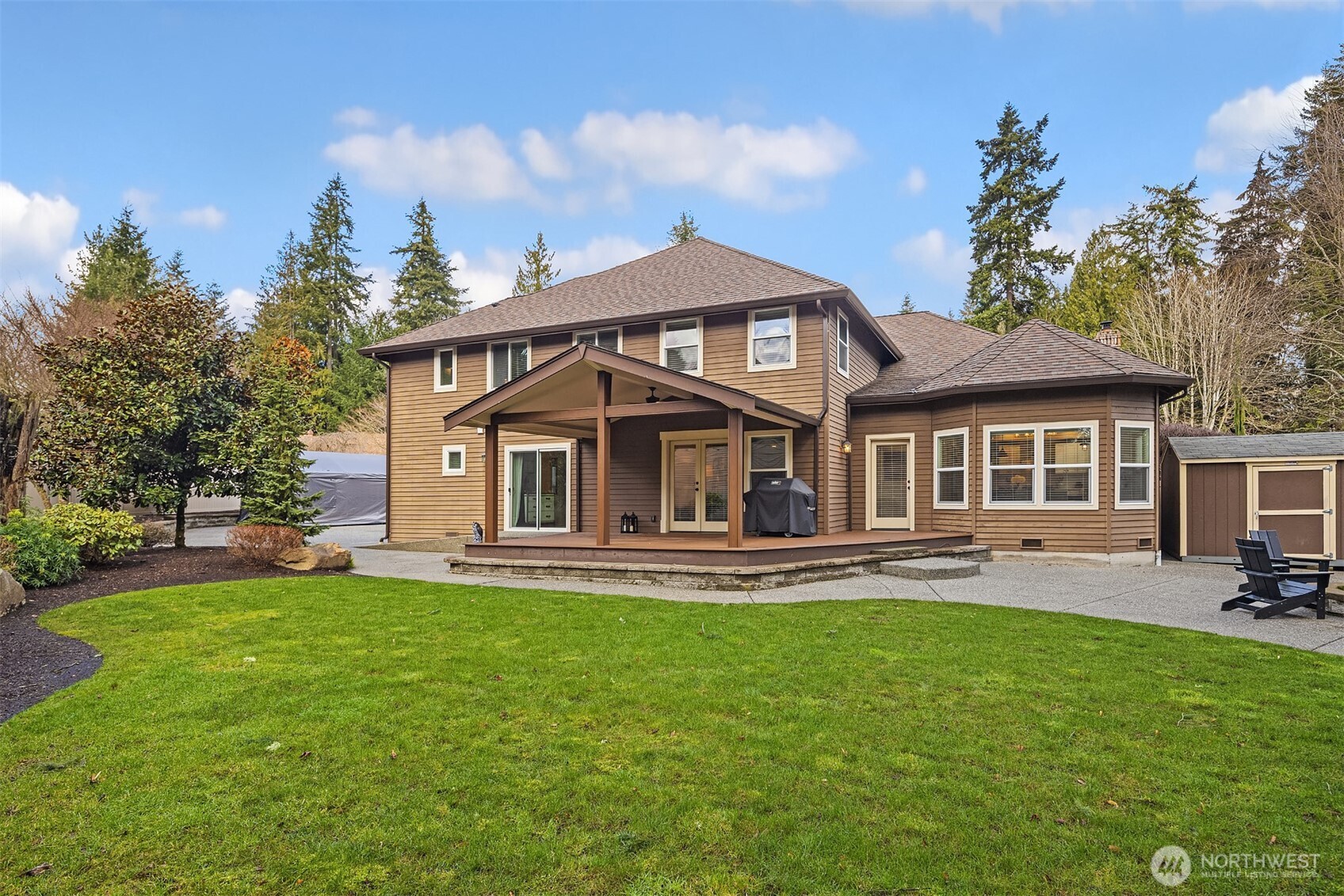 2730 187th Street Southeast Bothell, WA 98012 - Photo 34 of 38 a front view of a house with a yard