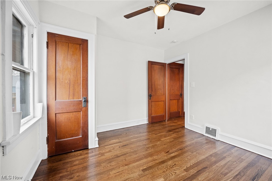 3561 Warren Road Cleveland, OH 44111 - Photo 12 of 28 bedroom featuring dark hardwood / wood-style flooring and ceiling fan