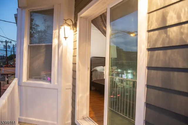 a bathroom with a glass door and shower