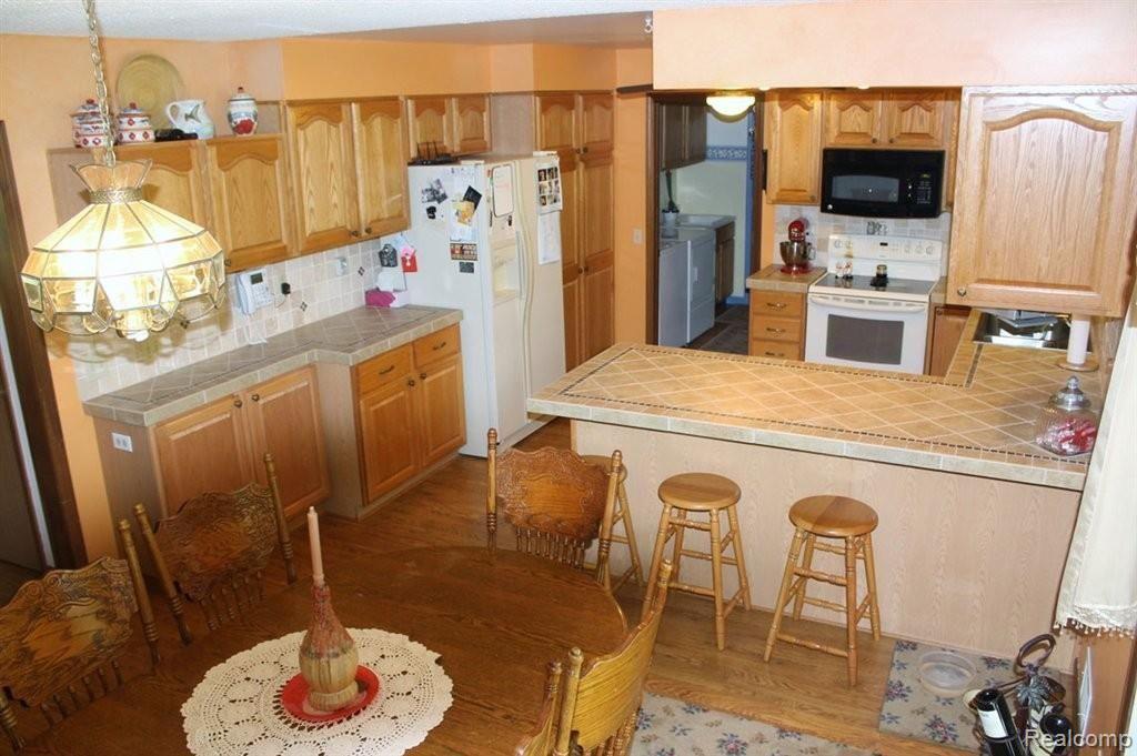 1105 Miller Road Allenton, MI 48002 - Photo 9 of 25 09-Kitchen.jpg