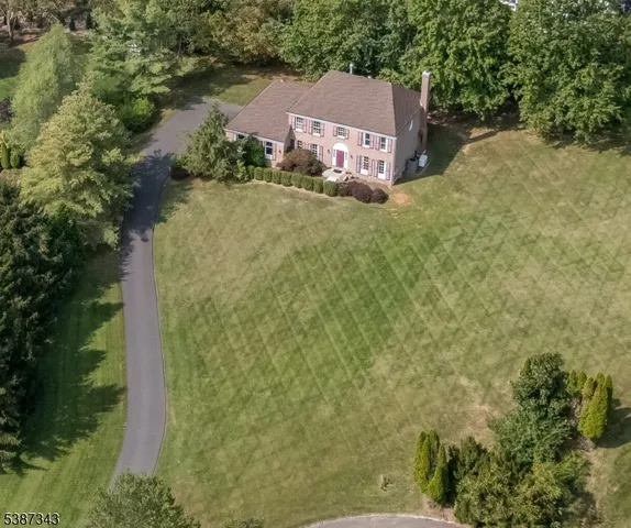 an aerial view of residential house with outdoor space