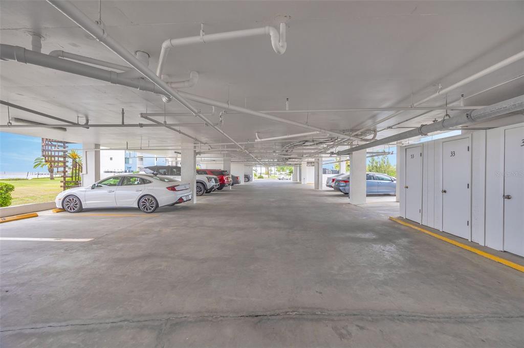 4620 Bay Boulevard, Unit 1117 Port Richey, FL 34668 - Photo 33 of 37 a view of parking space with cars parked