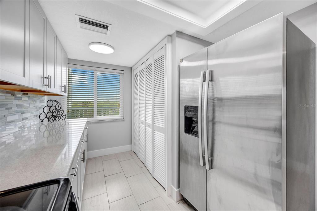 4620 Bay Boulevard, Unit 1117 Port Richey, FL 34668 - Photo 10 of 37 a bathroom with a bathtub and shower