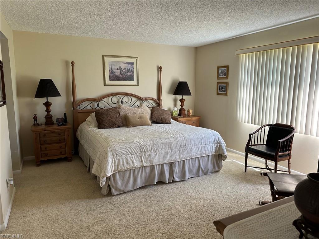 400 Teryl Road, Unit 1 Naples, FL 34112 - Photo 11 of 20 Master Bedroom