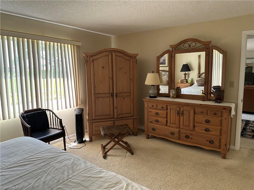 400 Teryl Road, Unit 1 Naples, FL 34112 - Photo 12 of 20 Master Bedroom