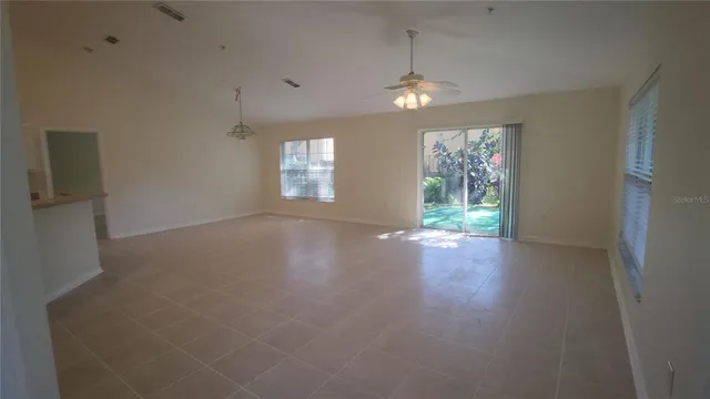 a view of a kitchen with a sink cabinets and window