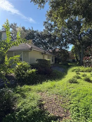 a view of a garden with a fountain