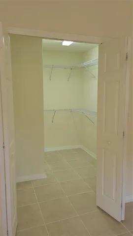 a bathroom with a shower and a toilet