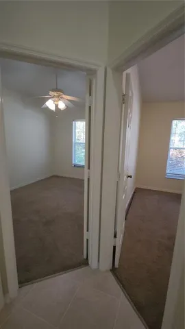 a view of a chandelier and window in a room