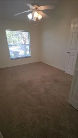 a bathroom with a shower and a bath tub