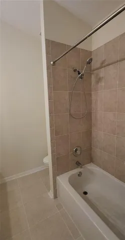 a view of a livingroom with kitchen